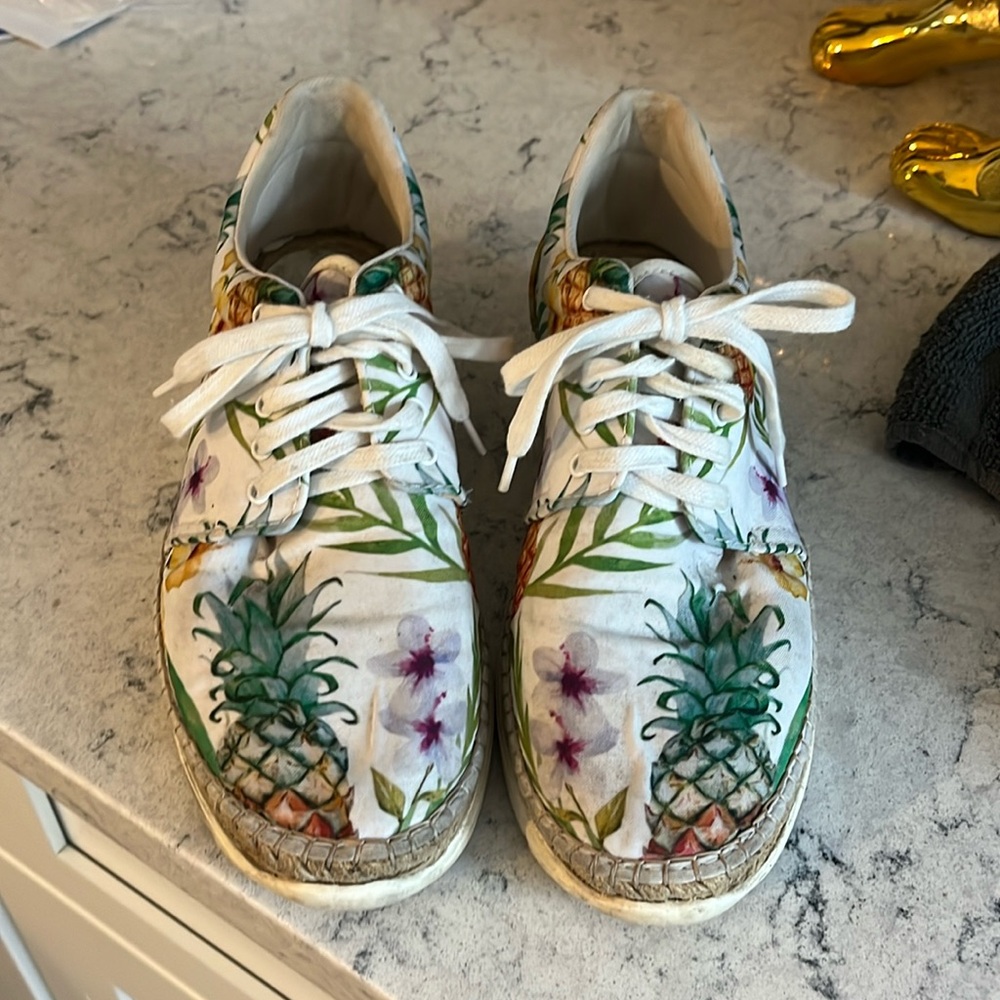 Free People sneakers. So cute lots of compliments. Just a half size too small.